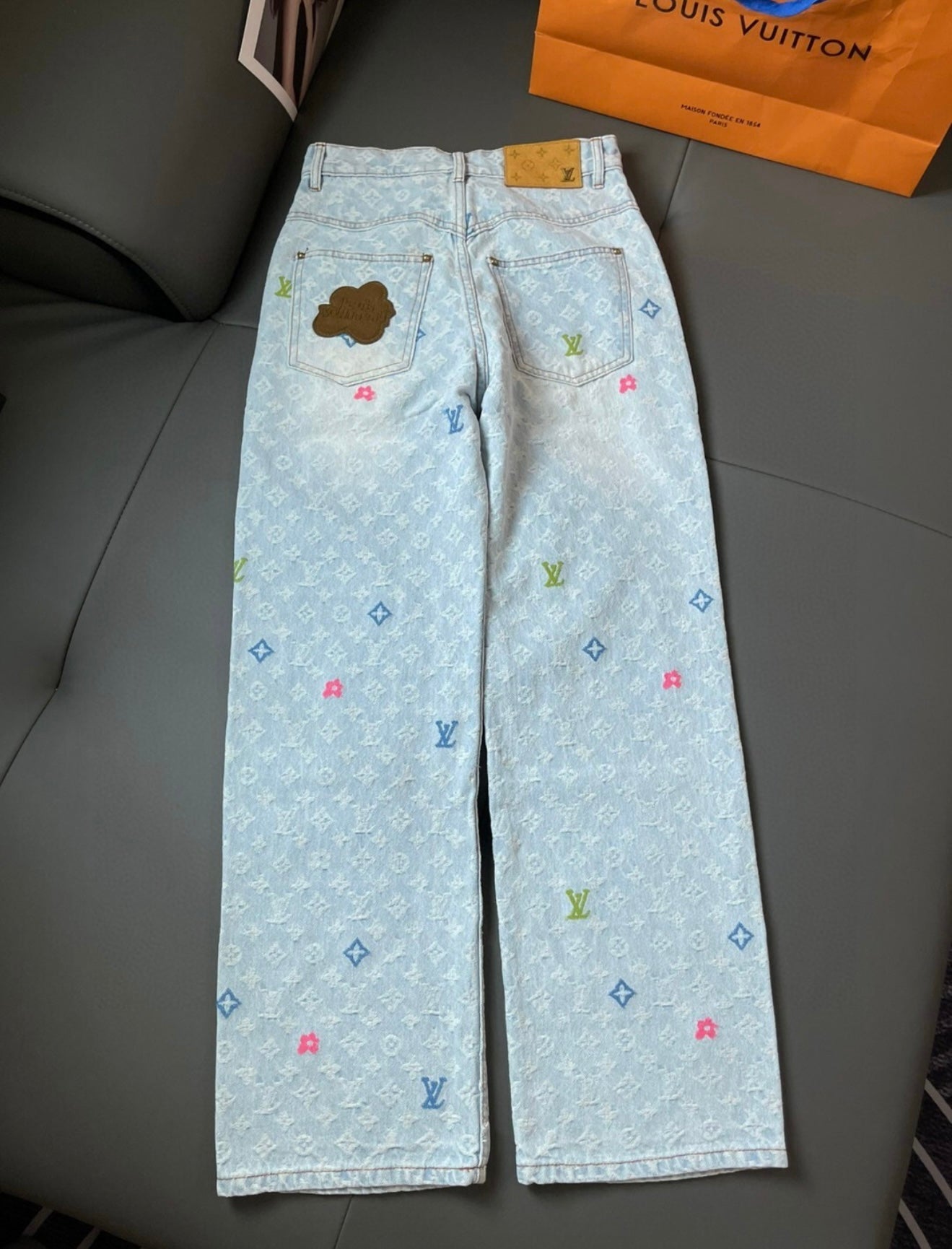 Women’s Designer Inspired Denim Pants With Logo All over Print in Numerous Colors